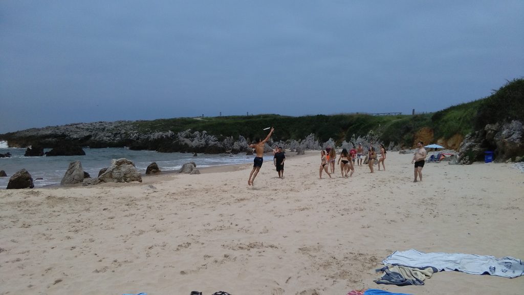 The group had fun playing an impromptu game of ultimate frisbee on the beach.